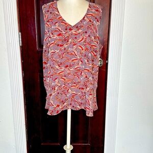 CAbi Good Luck crane sleeveless Blouse with 
Peplum detail